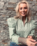 Cotton blouse with floral print in muted green